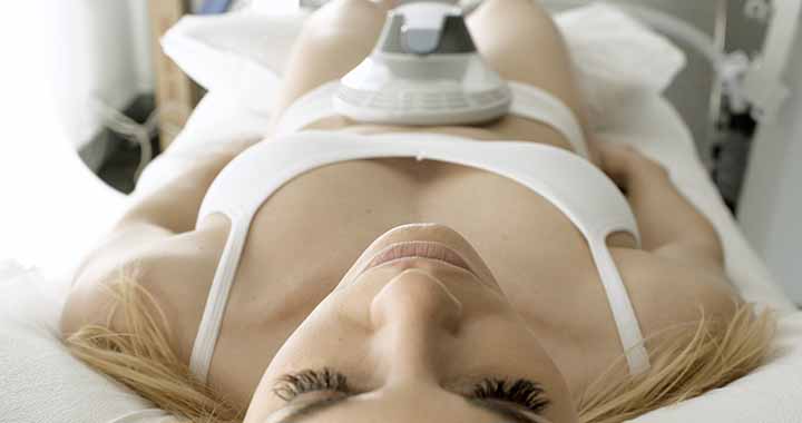Ariel View of Women in Surgical Bed Receiving Emsculpt Treatment