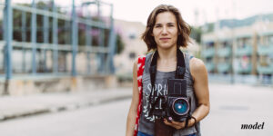 Young-female-holding-a-camera